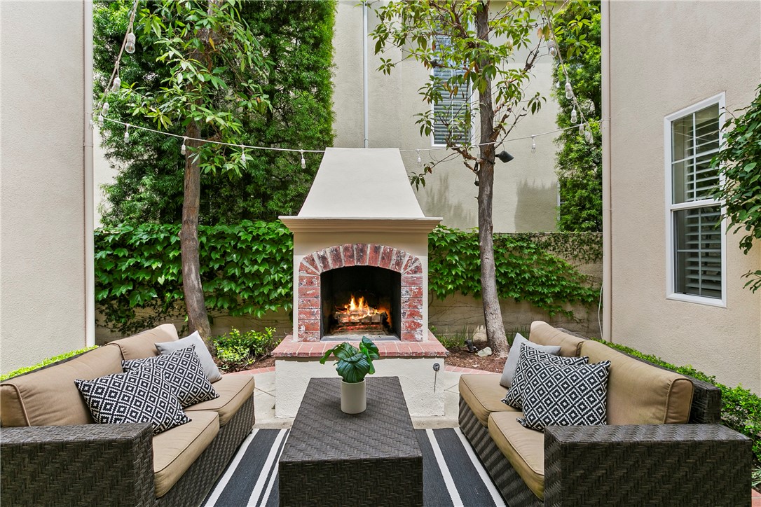 15 Winfield Drive Ladera Ranch, CA 92694 - Photo 8 of 43 a view of a patio with couches table and chairs and potted plants