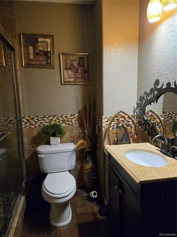 a bathroom with a sink and a toilet