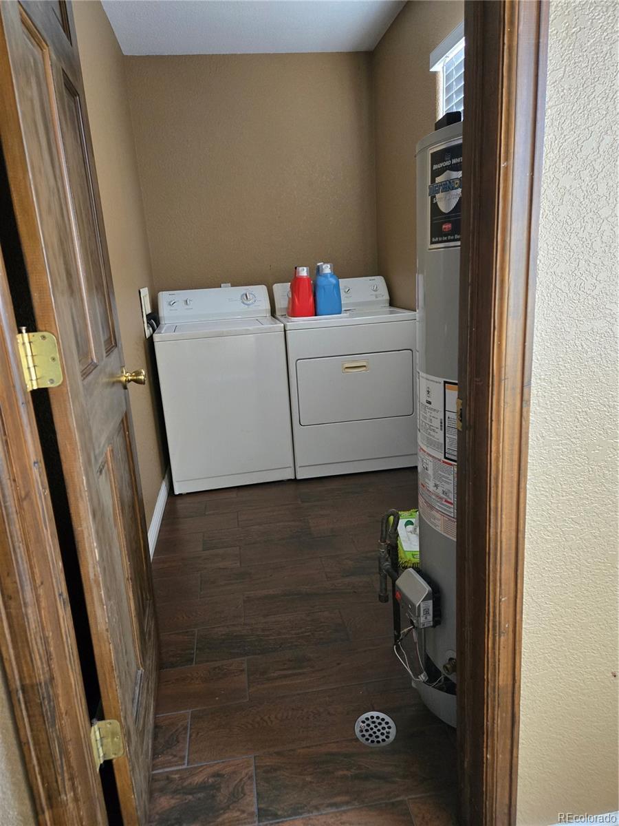 633 South Stuart Street Denver, CO 80219 - Photo 18 of 28 a bathroom with a sink and a shower