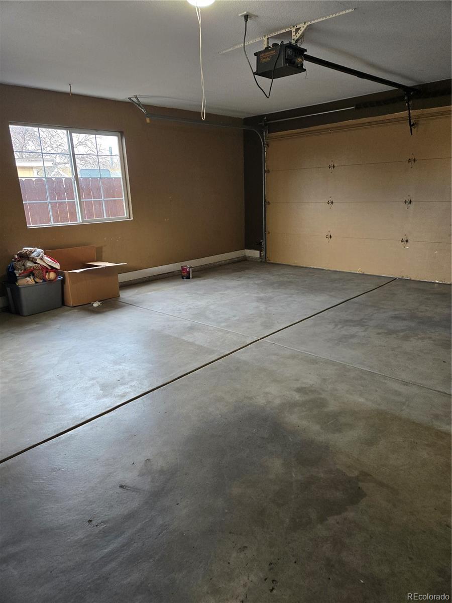 633 South Stuart Street Denver, CO 80219 - Photo 24 of 28 an empty room with windows