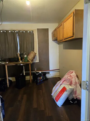 a bedroom with bed and a window