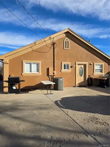 a front view of a house with a outdoor space