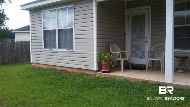 8877 Fall Court Mobile, AL 36695 - Photo 6 of 27 With the roof and slab, this porch would be easy to screen.