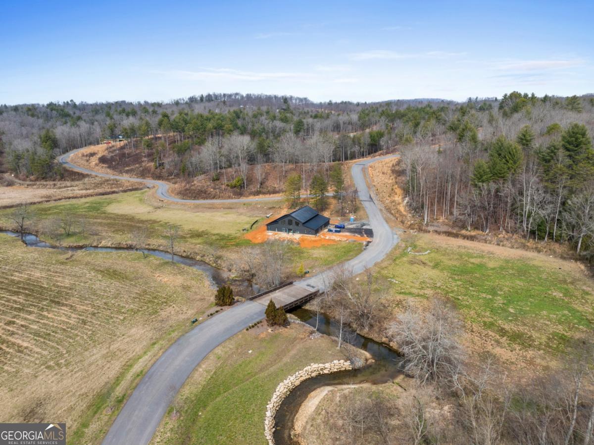 Lot 162 Ridges Of Blue Ridge Morganton, GA 30560 - Photo 14 of 16 a view of a swimming pool with a yard