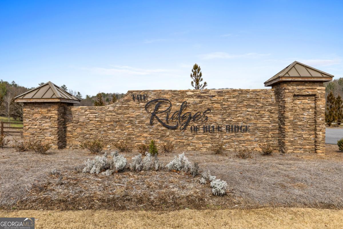 Lot 162 Ridges Of Blue Ridge Morganton, GA 30560 - Photo 7 of 16 a view of a dry yard with wooden fence