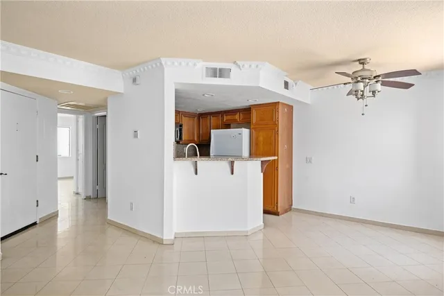 a view of a storage & utility room with a sink