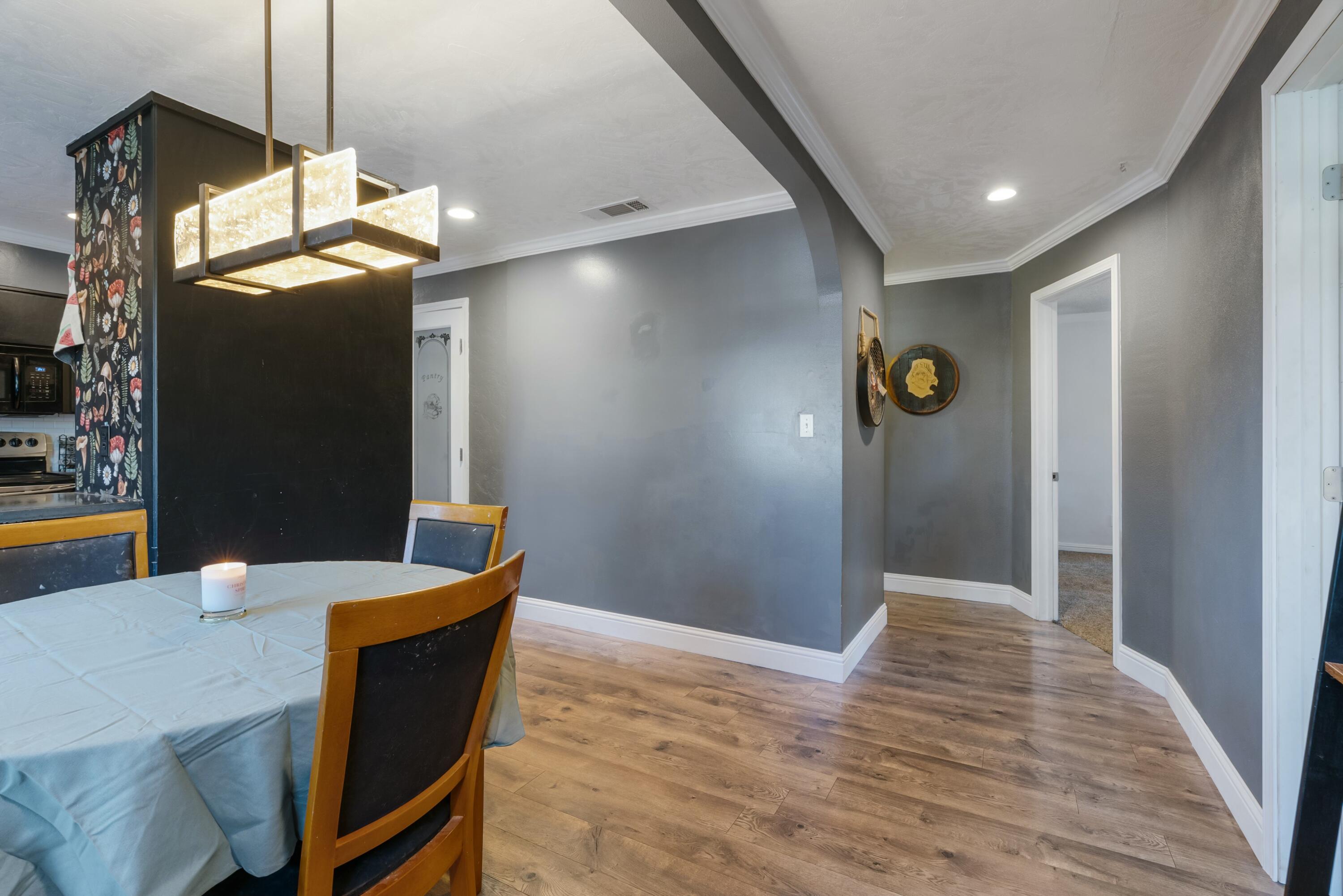 3145 Quartz Hill Road Redding, CA 96003 - Photo 14 of 32 a view of a dining room with a table and chairs