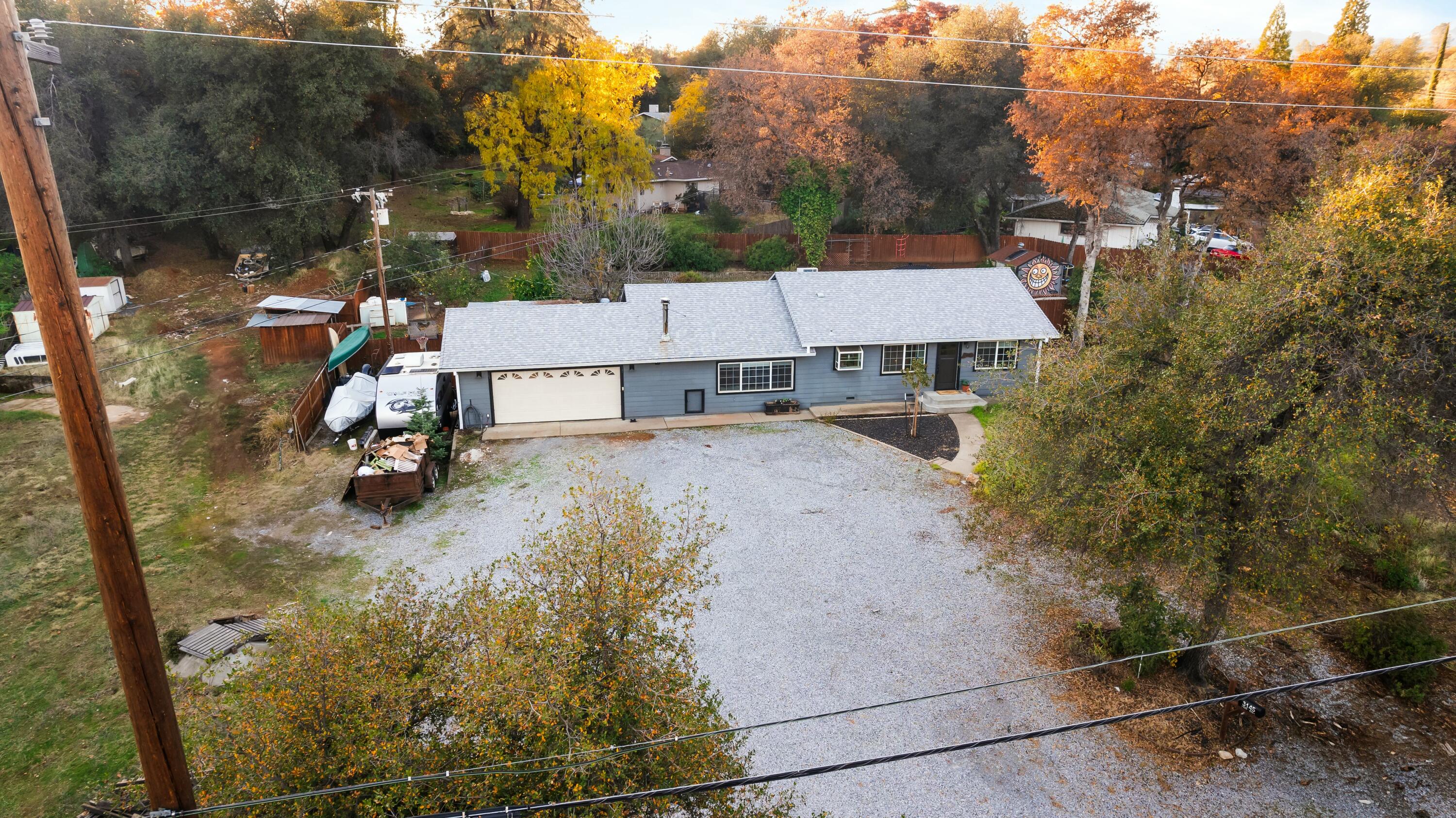 3145 Quartz Hill Road Redding, CA 96003 - Photo 32 of 32 an aerial view of a house with yard and mountain view in back