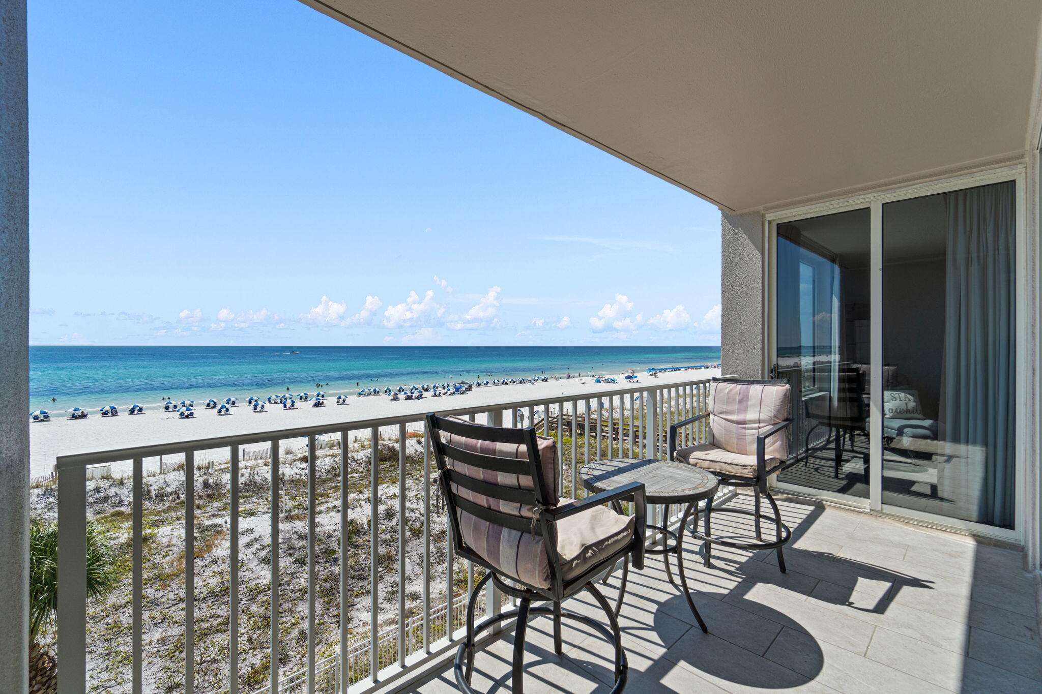 520 Santa Rosa Boulevard, Unit 404 Fort Walton Beach, FL 32548 - Photo 21 of 44 a view of chairs and table on the terrace