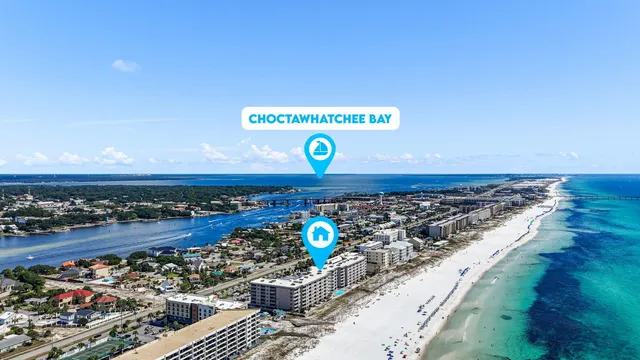 a view of a room with water heater and wooden floors