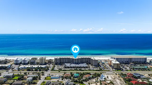 a view of a city with an ocean view