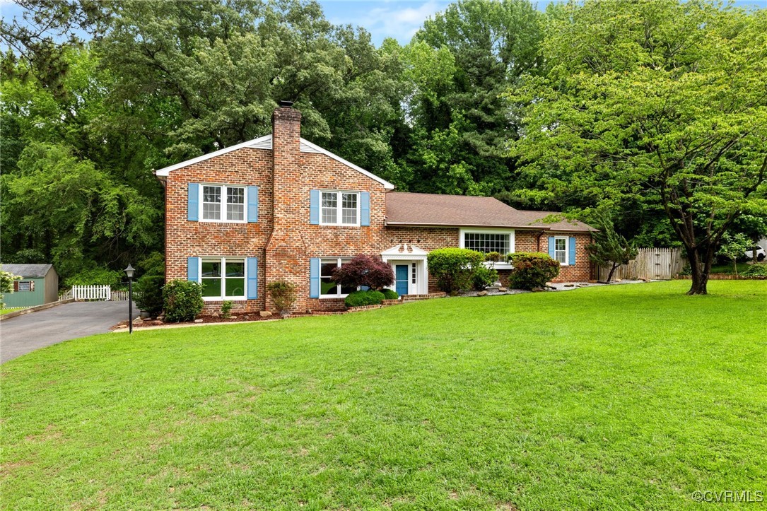 3449 Cedar Grove Road Richmond, VA 23235 - Photo 1 of 1 a front view of a house with a yard