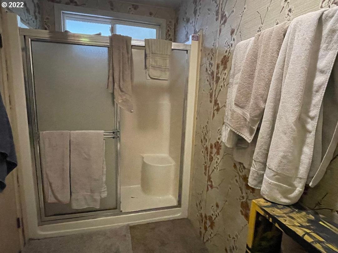 262 Evergreen Ridge Road Riddle, OR 97469 - Photo 13 of 13 a bathroom with a shower
