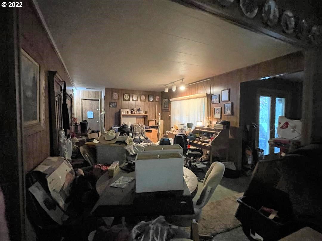 262 Evergreen Ridge Road Riddle, OR 97469 - Photo 2 of 13 a living room with lots of furniture and a large window