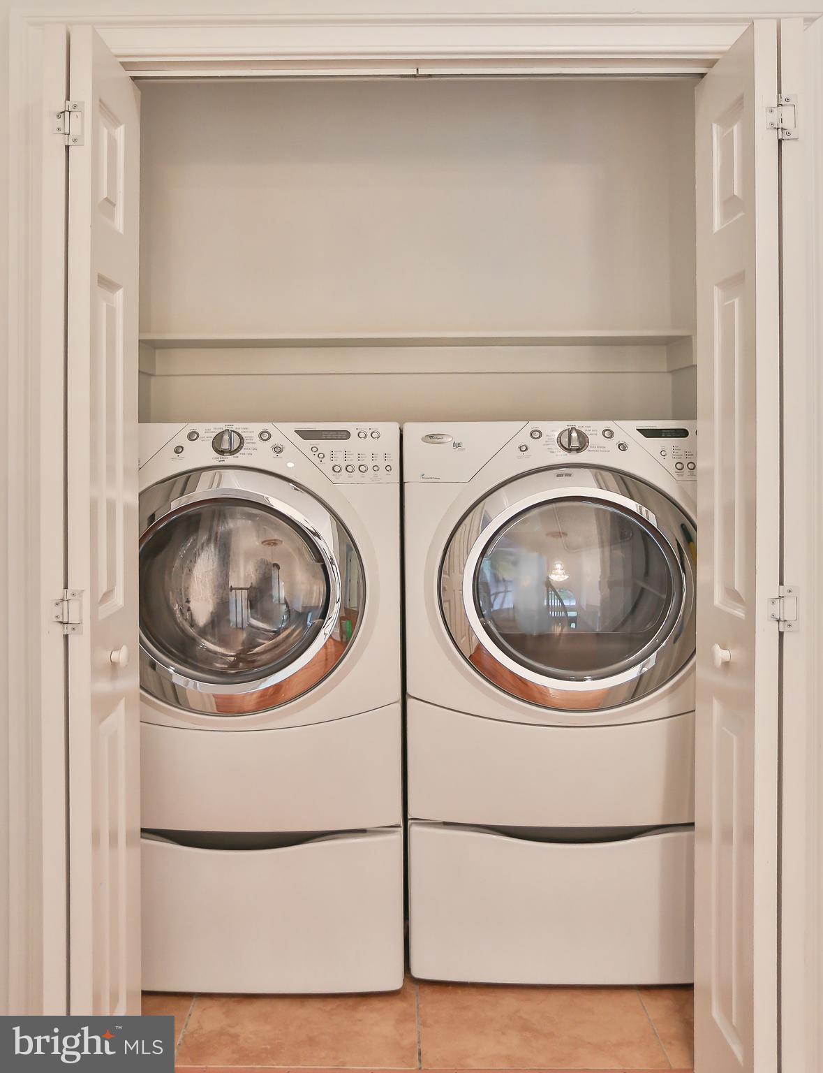 7215 Tanager Street Springfield, VA 22150 - Photo 23 of 43 Main Level Laundry w/ Front Loading Washer & Dryer