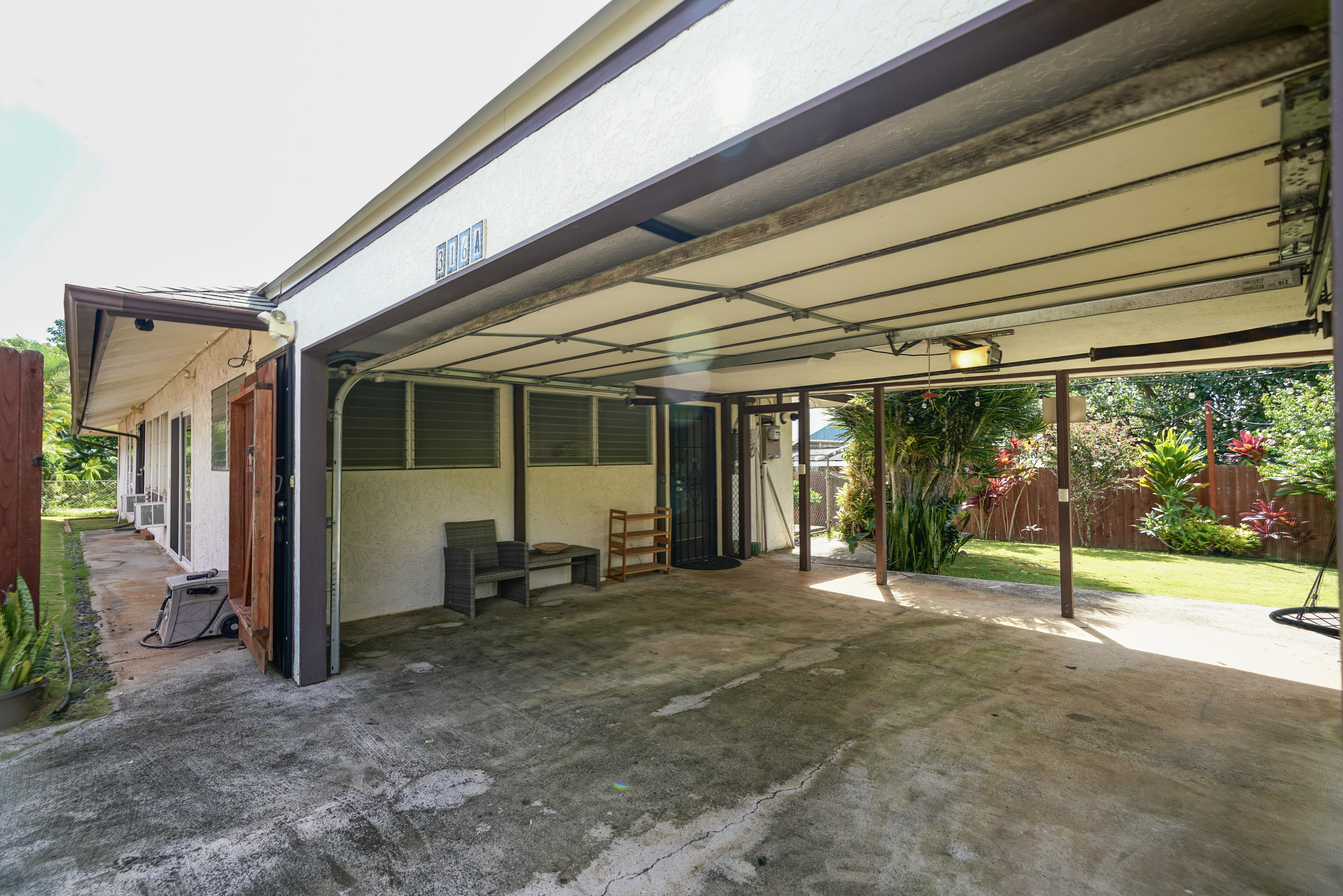 316 A Makani Road, Unit A Kapaa, HI 96746 - Photo 26 of 29 a view of a house with porch and furniture