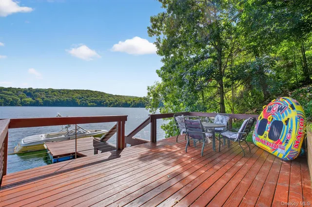 a view of a terrace with furniture and a table