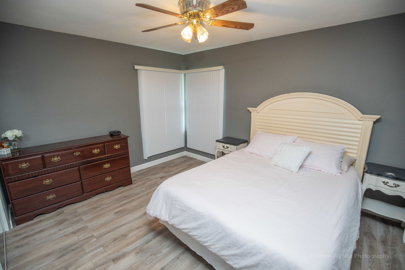1610 Black Road Joliet, IL 60435 - Photo 11 of 25 a bedroom with a bed and a dresser