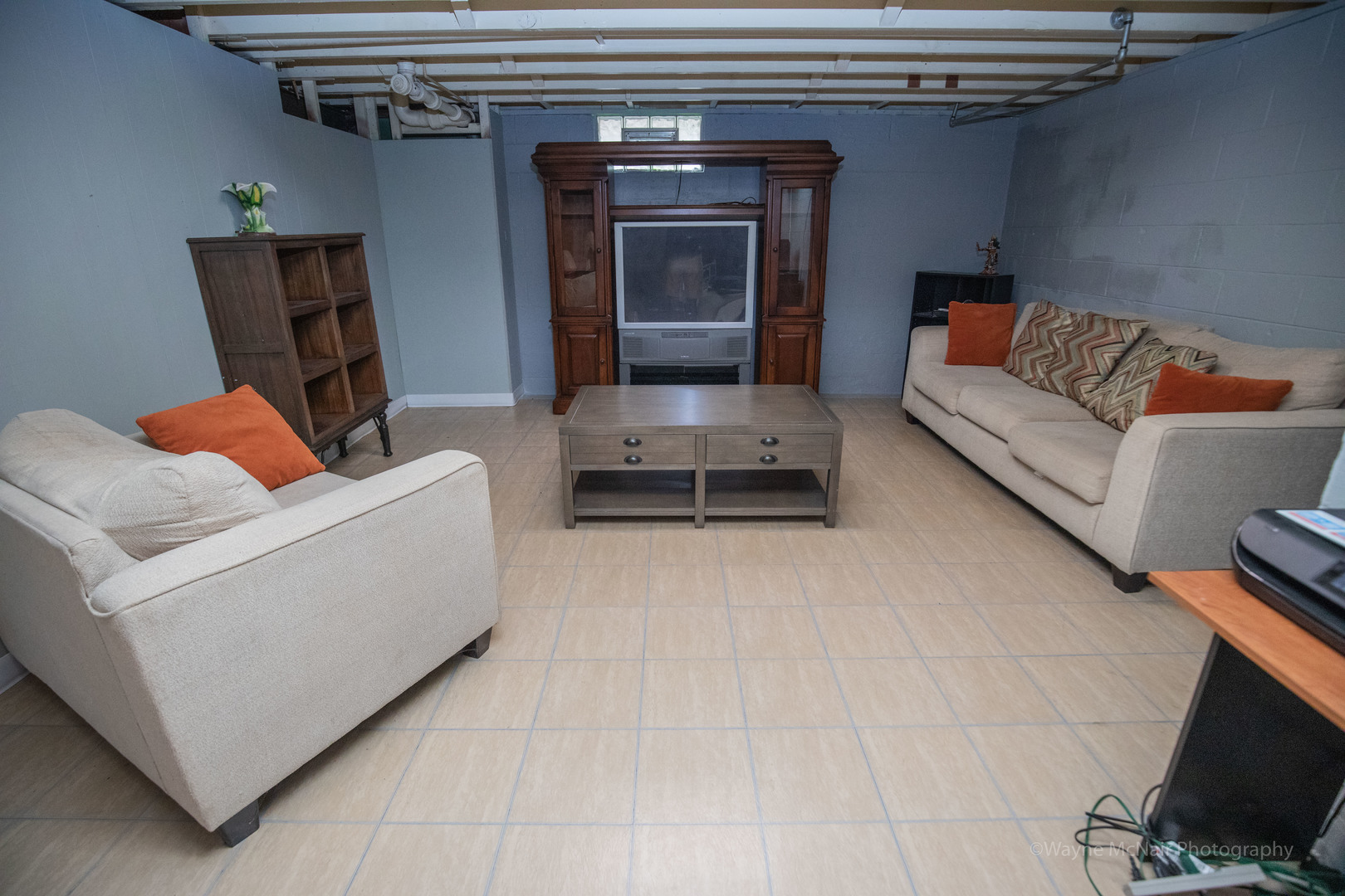 1610 Black Road Joliet, IL 60435 - Photo 16 of 25 a living room with furniture and a fireplace