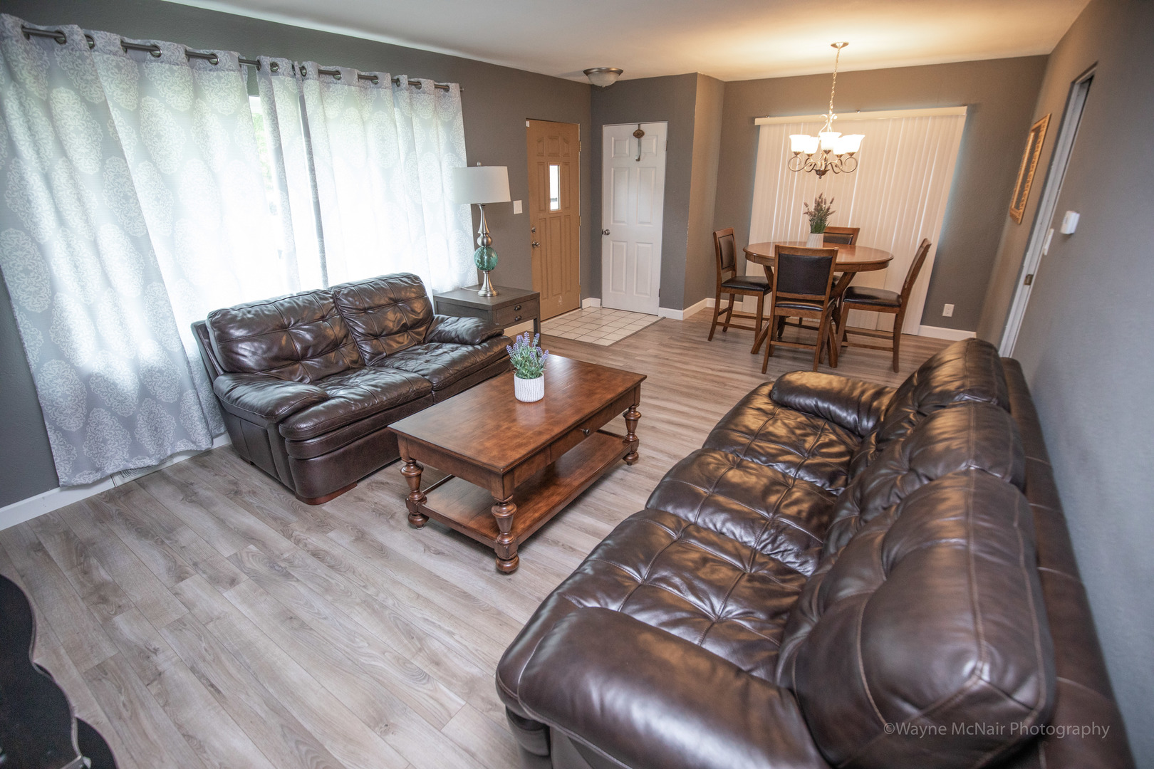 1610 Black Road Joliet, IL 60435 - Photo 3 of 25 a living room with furniture and a table