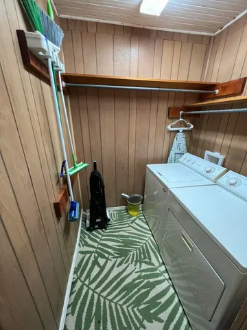 a bedroom with a bed and a view of bathroom