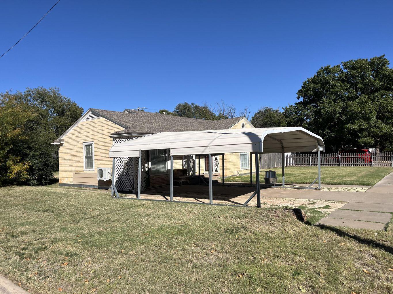120 Southwest 10th Plainview, TX 79072 - Photo 22 of 27 a view of a house with a yard