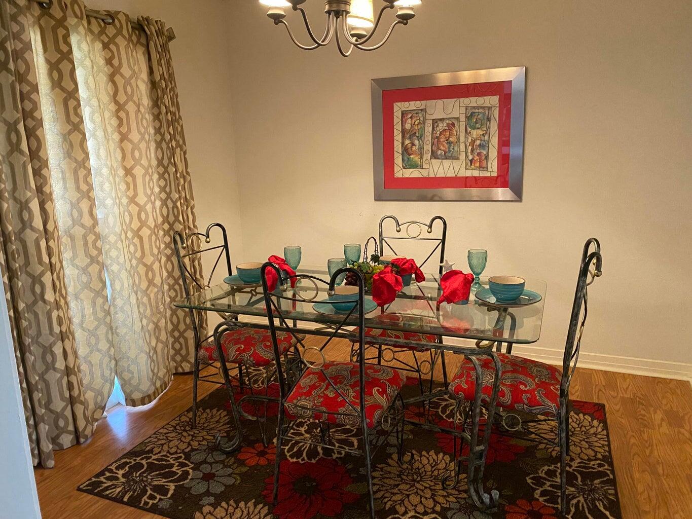 120 Southwest 10th Plainview, TX 79072 - Photo 10 of 27 a view of a dining room with furniture and rug