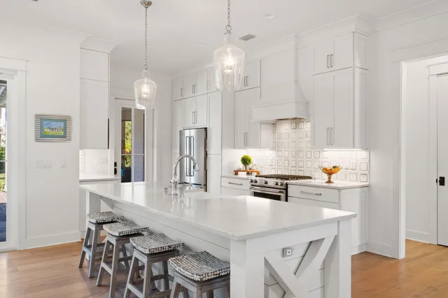 a view of a park with a slide fence and a yard