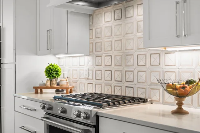 an aerial view of a house with swimming pool and garden