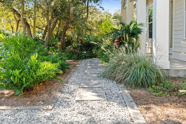 a kitchen with stove a sink and refrigerator