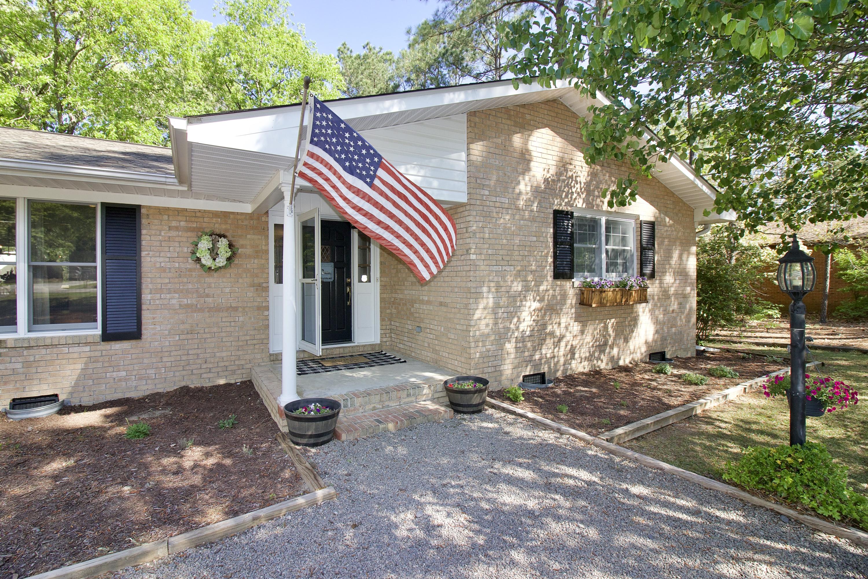 1212 Rays Bridge Road Whispering Pines, NC 28327 - Photo 2 of 42 Front