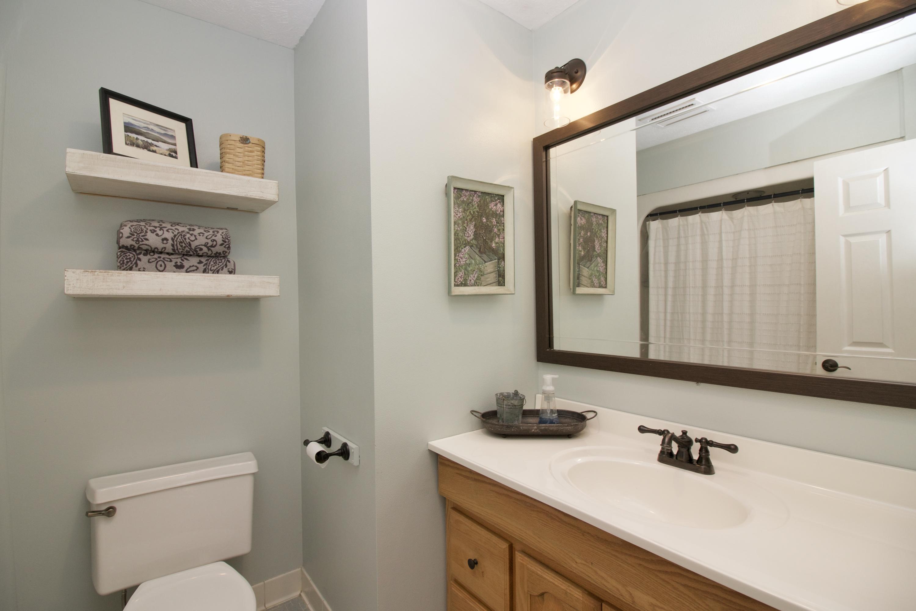 1212 Rays Bridge Road Whispering Pines, NC 28327 - Photo 28 of 42 Hall Bathroom