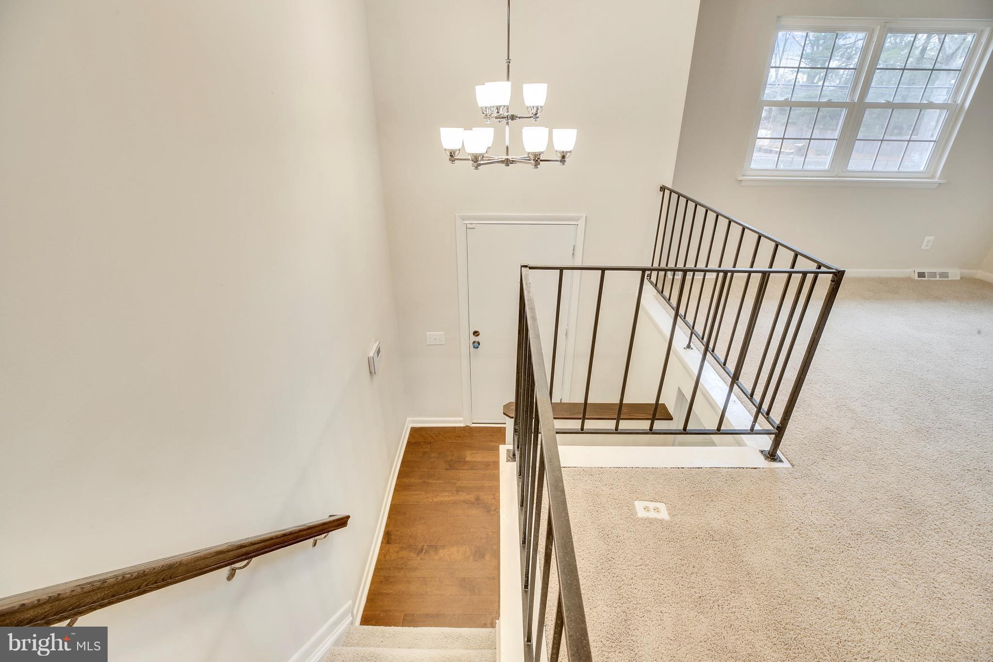 205 Burns Crossing Road Severn, MD 21144 - Photo 2 of 30 a view of a hallway with windows