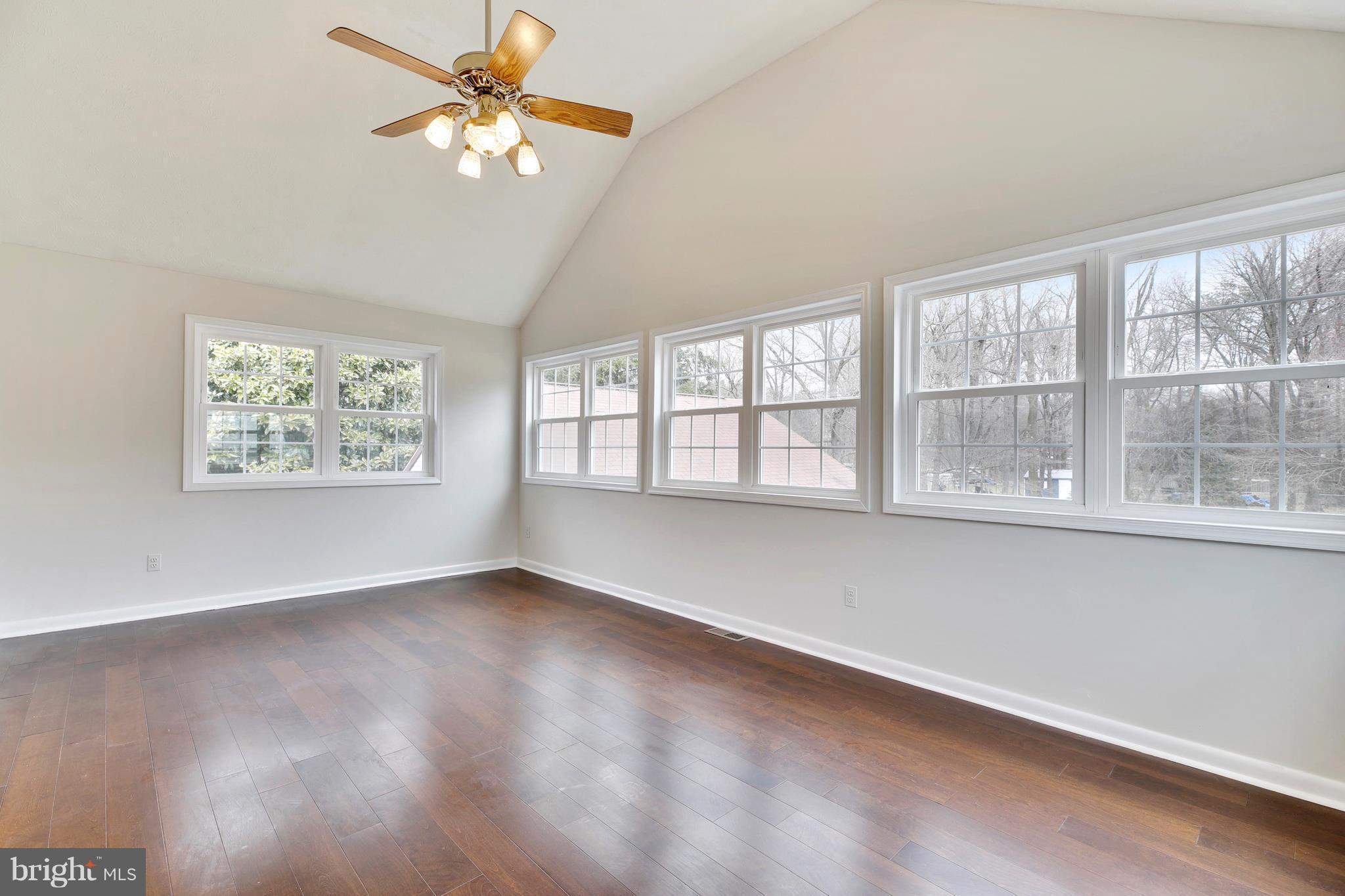 205 Burns Crossing Road Severn, MD 21144 - Photo 11 of 30 wooden floor in an empty room with a window