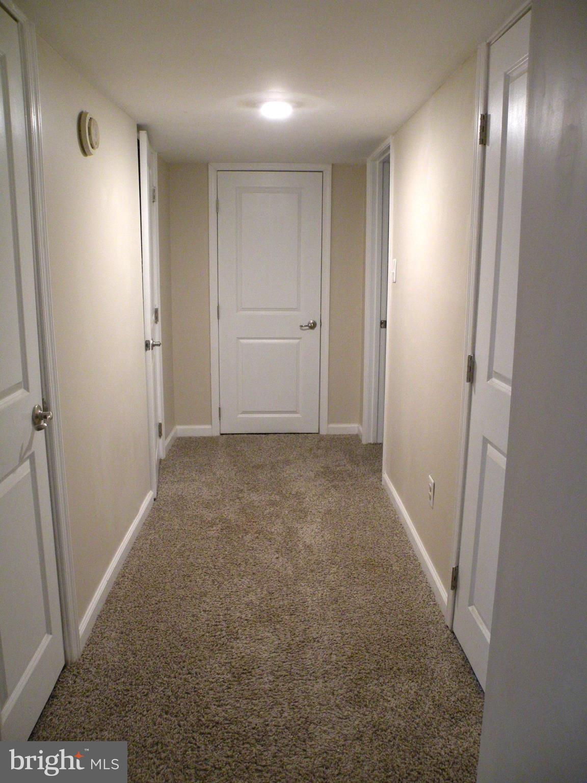 205 Burns Crossing Road Severn, MD 21144 - Photo 21 of 30 a view of hallway with an empty space