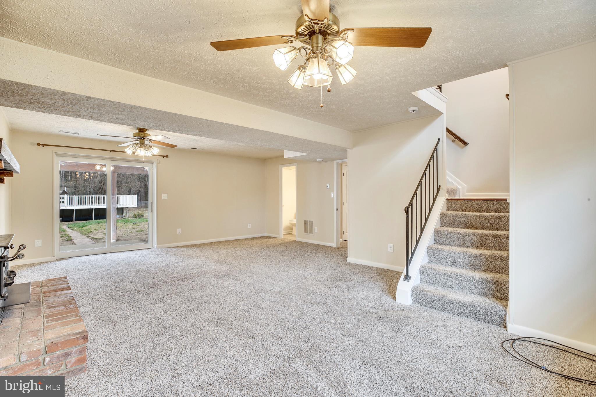 205 Burns Crossing Road Severn, MD 21144 - Photo 23 of 30 wooden floor in an empty room with a window