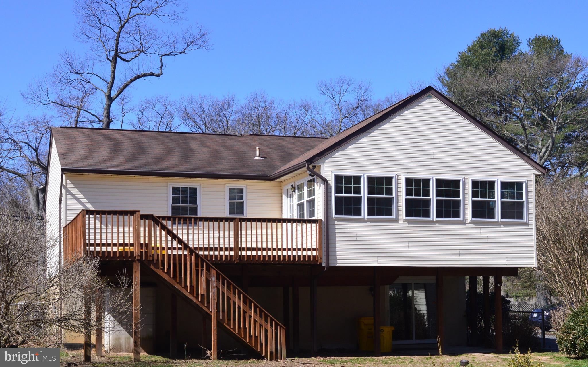 205 Burns Crossing Road Severn, MD 21144 - Photo 29 of 30 a front view of a house with balcony