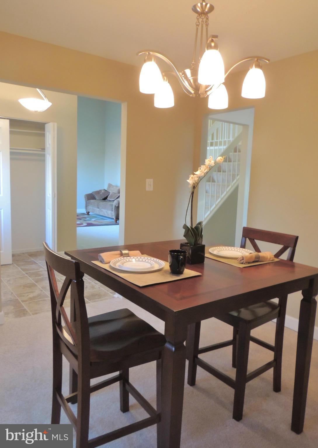 4803 Ebenezer Road Nottingham, MD 21236 - Photo 21 of 29 a view of a dining room and a table