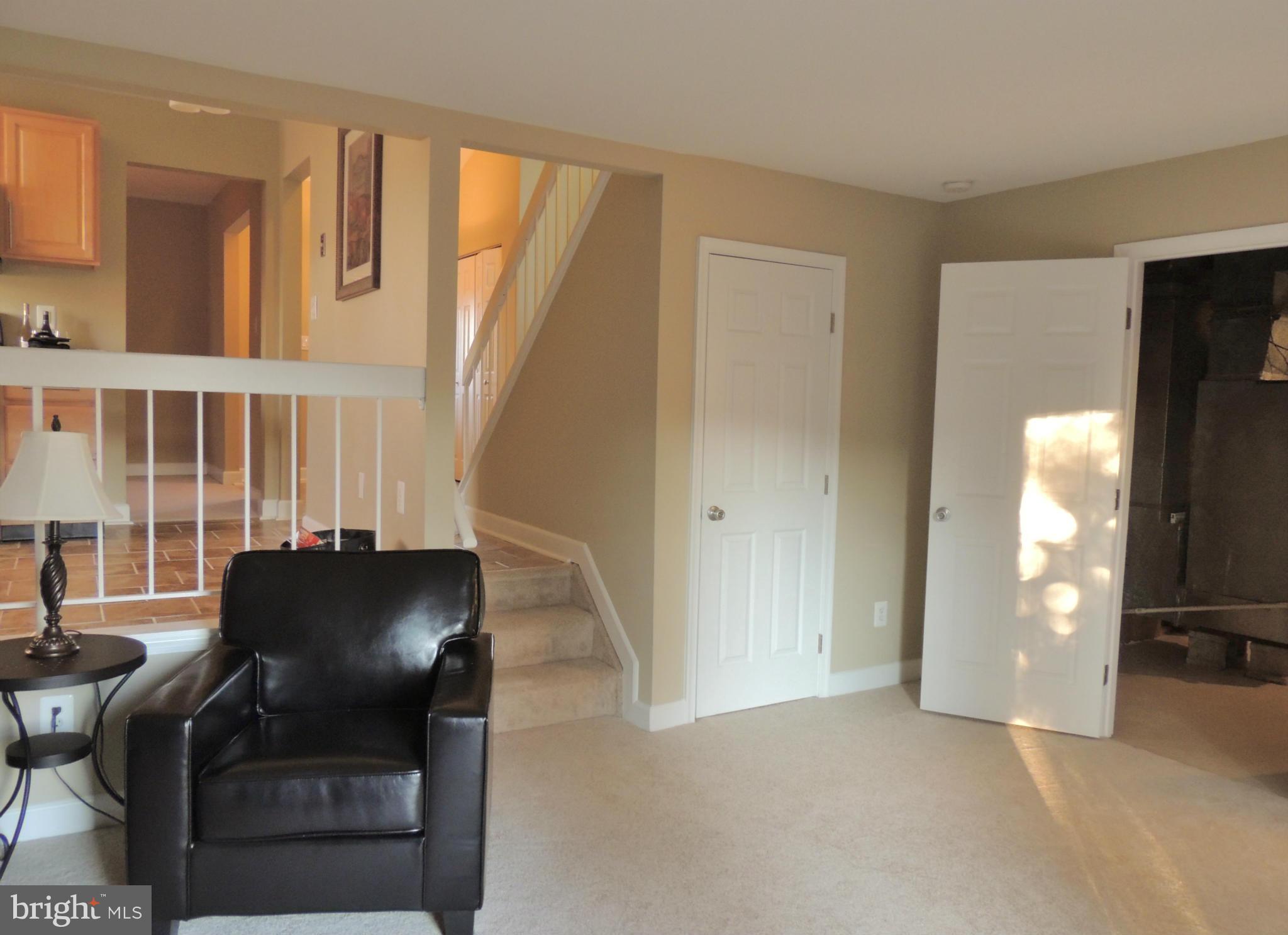 4803 Ebenezer Road Nottingham, MD 21236 - Photo 26 of 29 a view of a livingroom with furniture and staircase