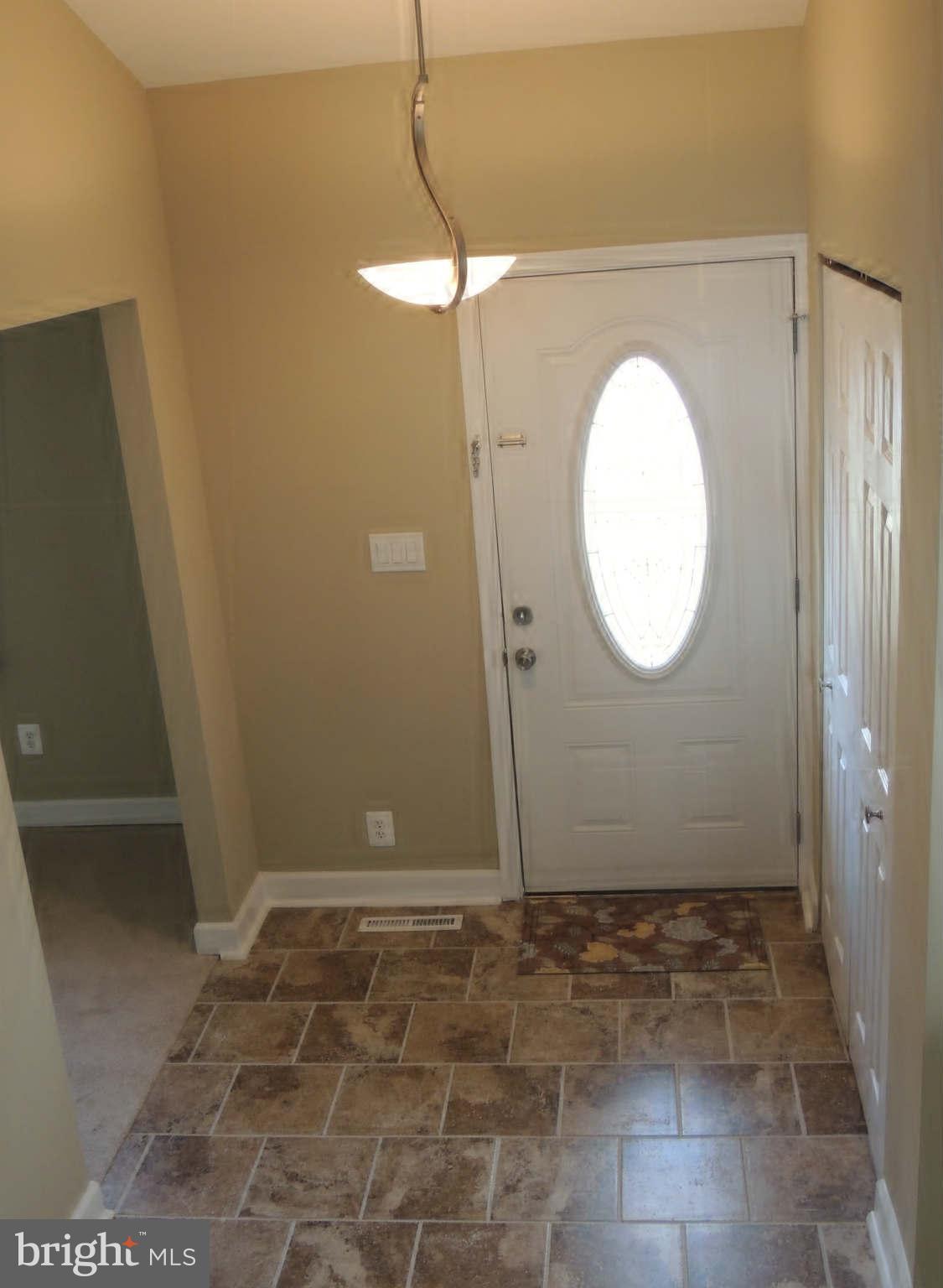 4803 Ebenezer Road Nottingham, MD 21236 - Photo 4 of 29 a view of a room with door