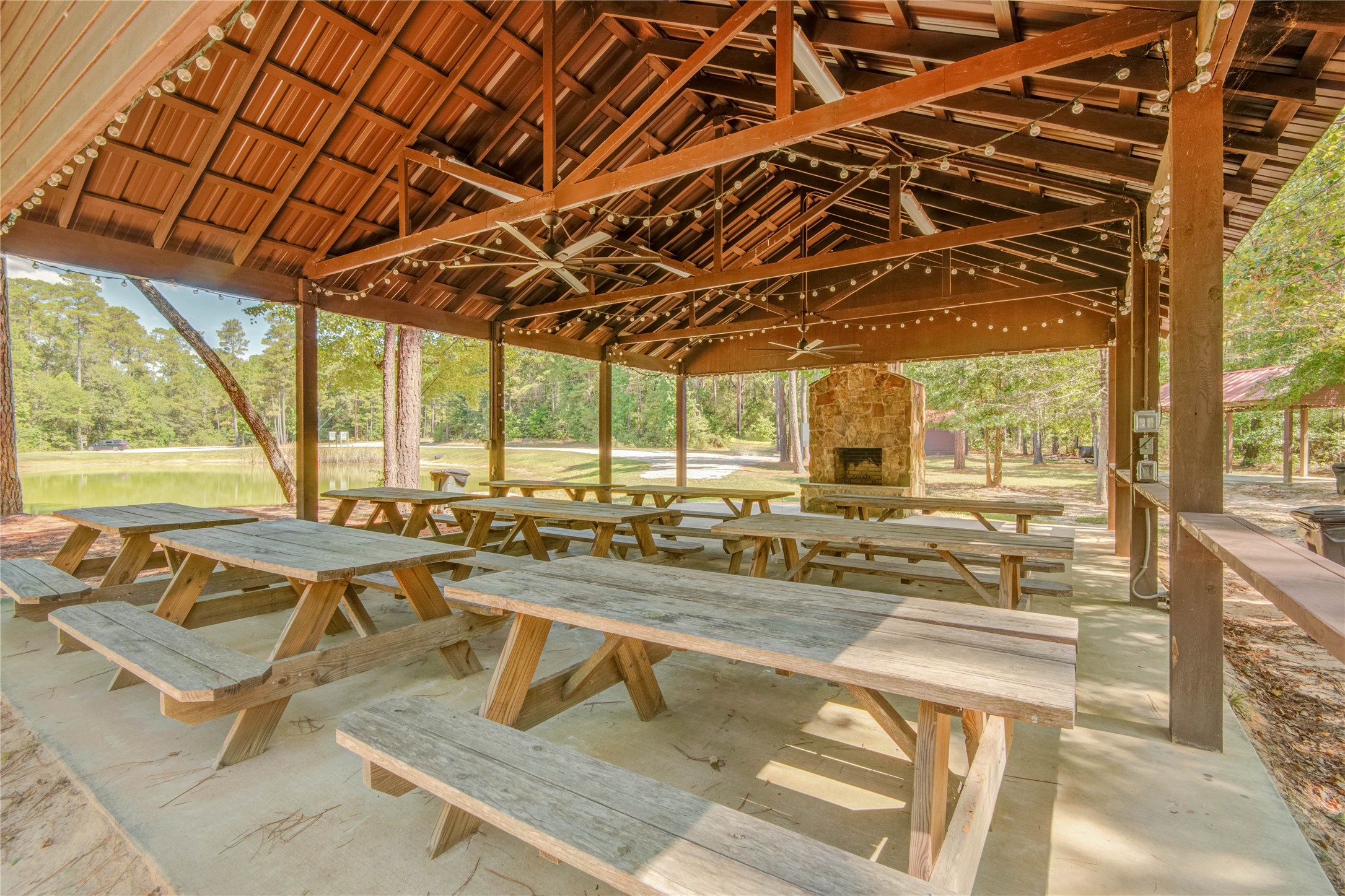 185 Rim Rock Road Huntsville, TX 77340 - Photo 14 of 19 a view of a swimming pool with outdoor seating