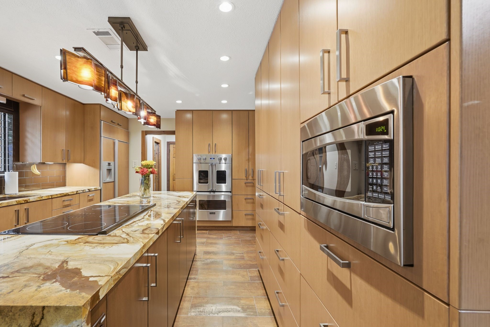 15007 Benfer Road Houston, TX 77069 - Photo 13 of 42 All of the cabinets have interior lighting and there are also under cabinets lights too!