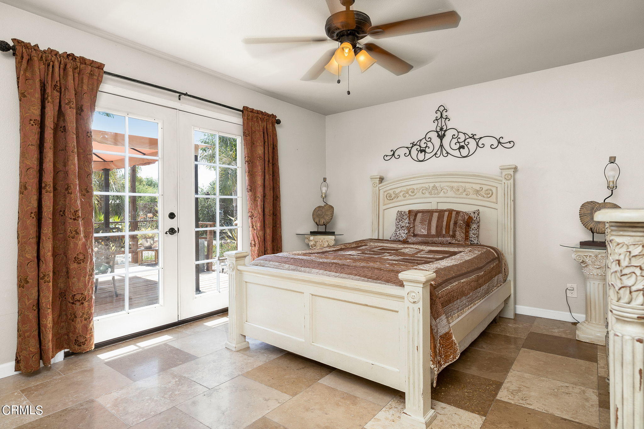 52 Grapevine Road Oak View, CA 93022 - Photo 15 of 52 a bedroom with a bed and a large window