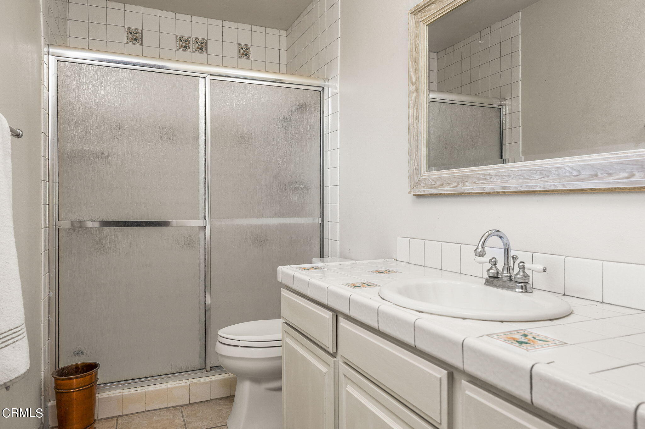 52 Grapevine Road Oak View, CA 93022 - Photo 17 of 52 a bathroom with a sink toilet and shower