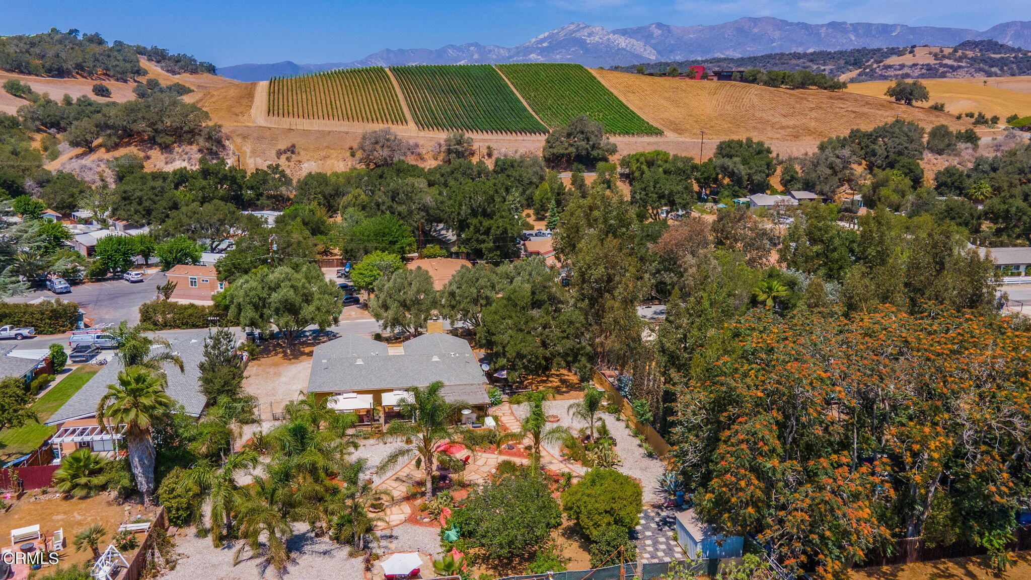 52 Grapevine Road Oak View, CA 93022 - Photo 45 of 52 an aerial view of a houses with a lake and a yard