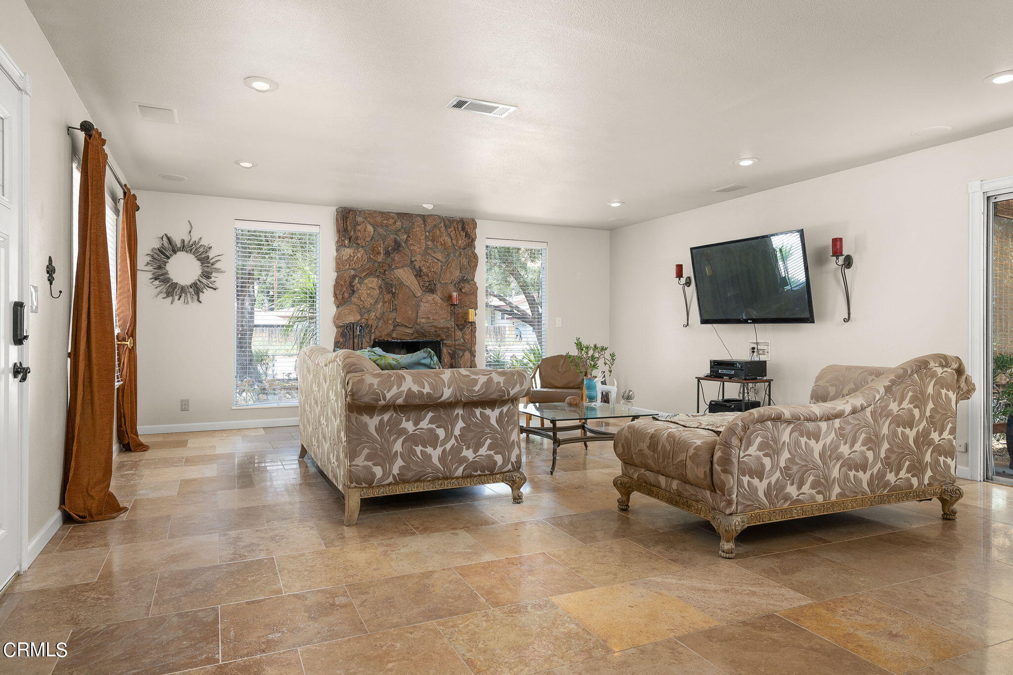 52 Grapevine Road Oak View, CA 93022 - Photo 7 of 52 a living room with furniture and a flat screen tv