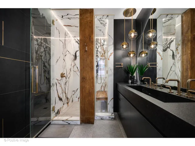 a kitchen with a refrigerator and a sink