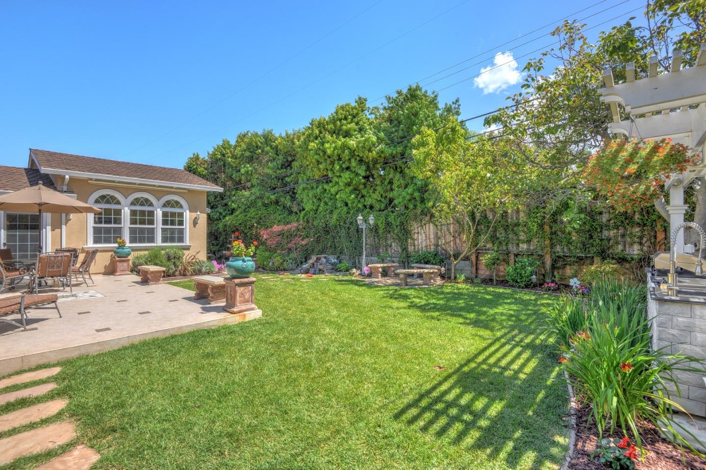 1042 Celilo Drive Sunnyvale, CA 94087 - Photo 27 of 27 a view of a backyard with sitting area