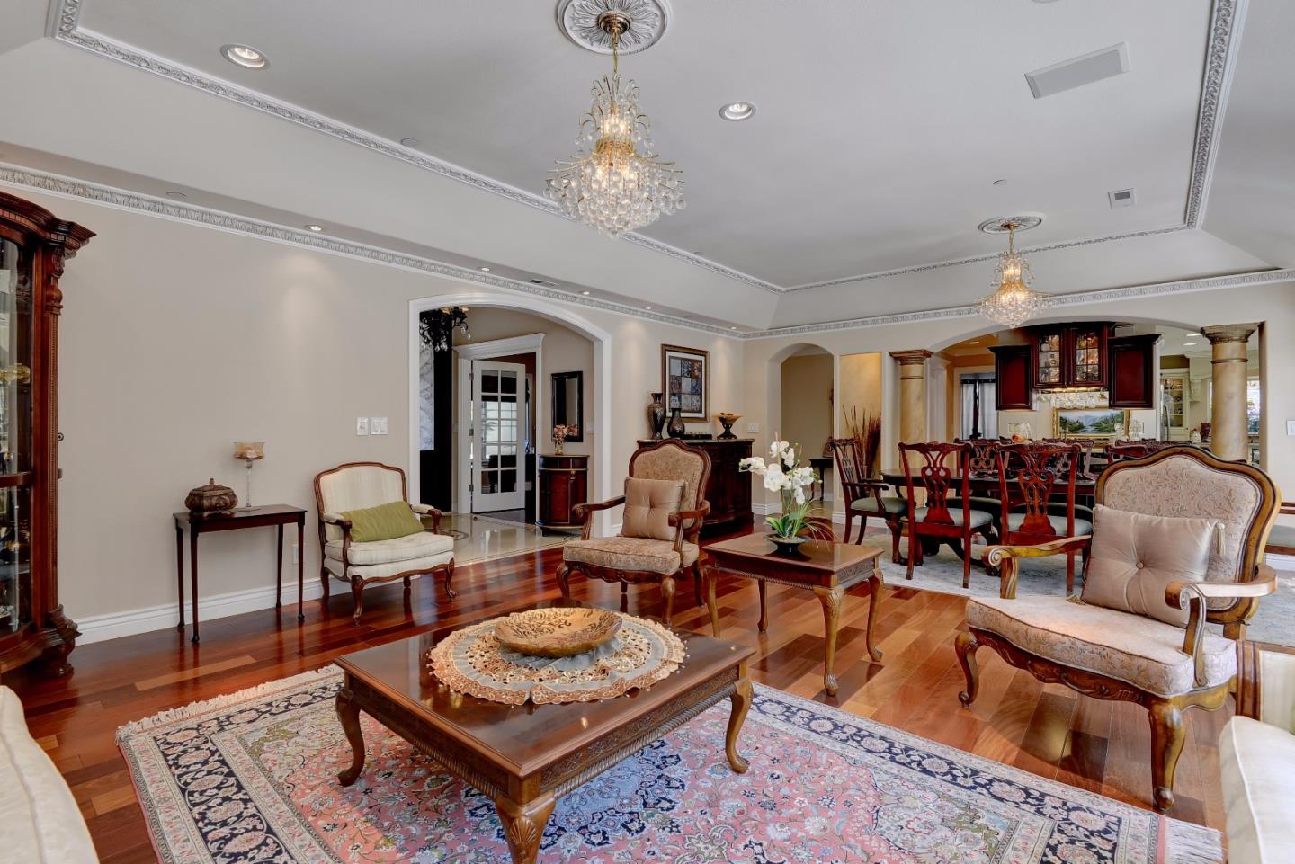 1042 Celilo Drive Sunnyvale, CA 94087 - Photo 6 of 27 a living room with furniture a table and kitchen chandelier