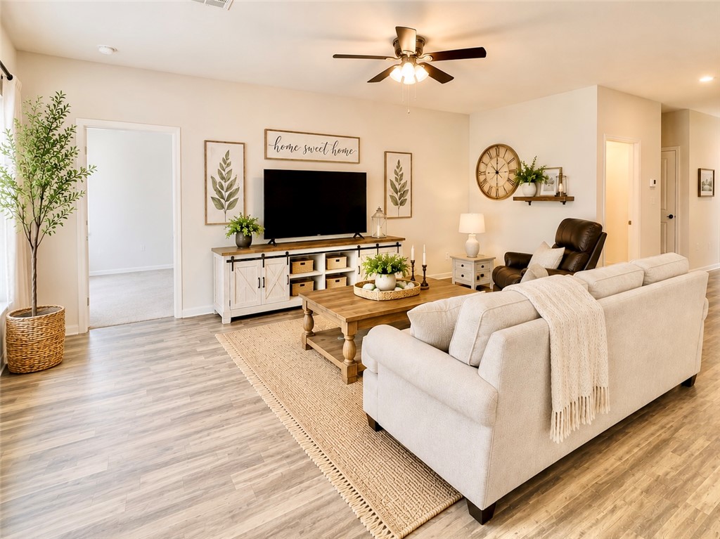 137 Windmill Road Somerville, TX 77879 - Photo 7 of 17 a living room with furniture and a flat screen tv